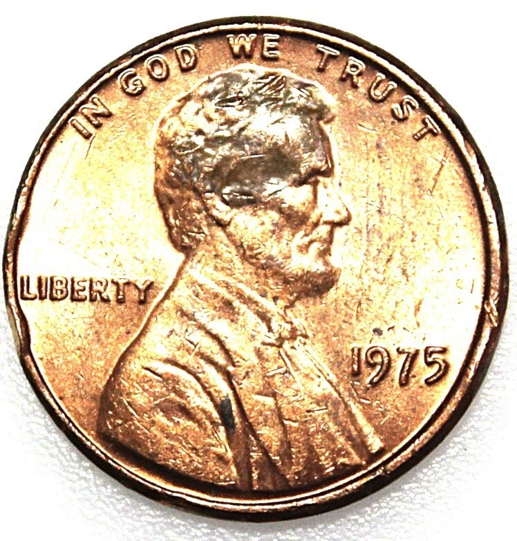 1975 penny multi-strike or fold-over strike error showing overlapping design impressions or coin fold
